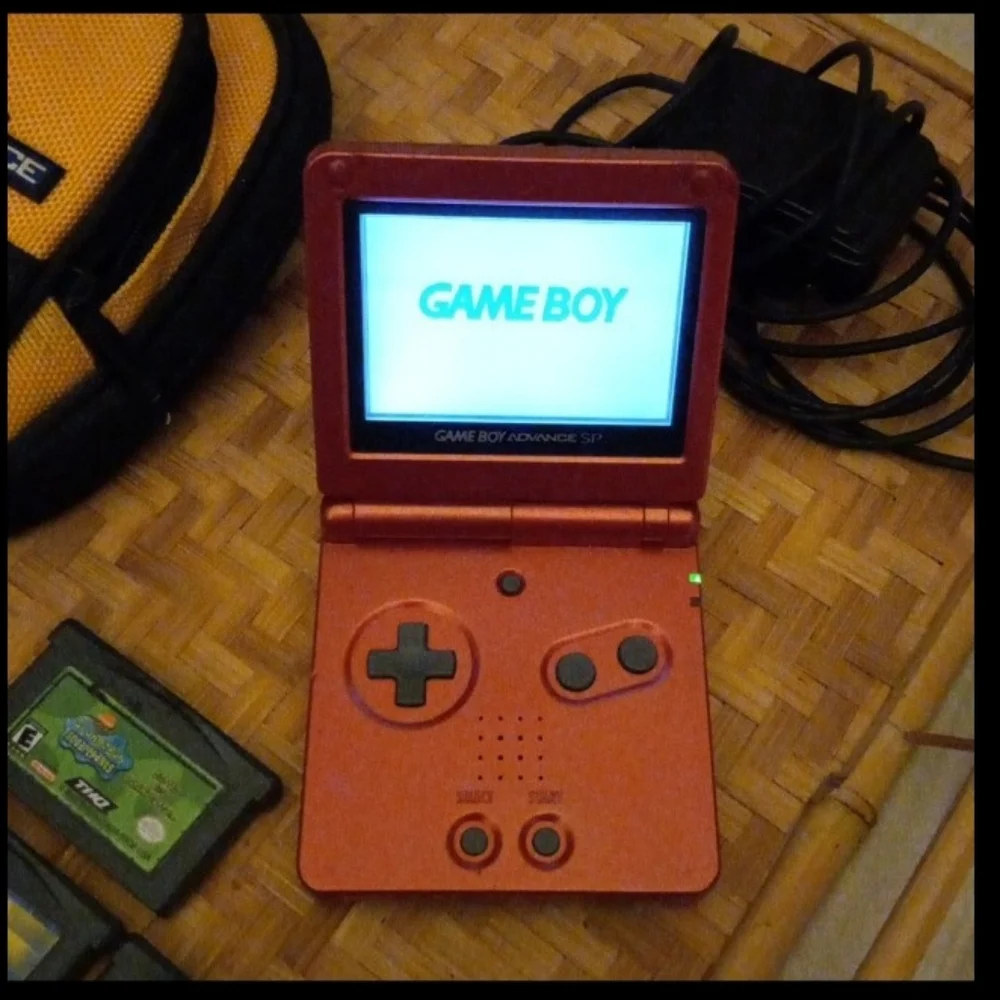 Nintendo Game Boy Advance SP w/10 Games, Charger and Carrying Case 2002